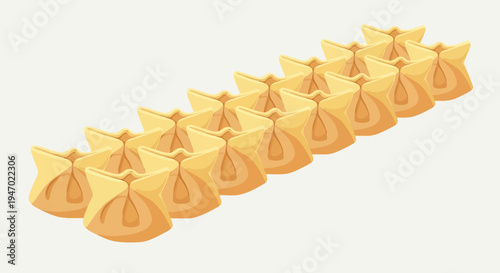 A line of golden-yellow dumplings arranged in a diagonal pattern against a light background