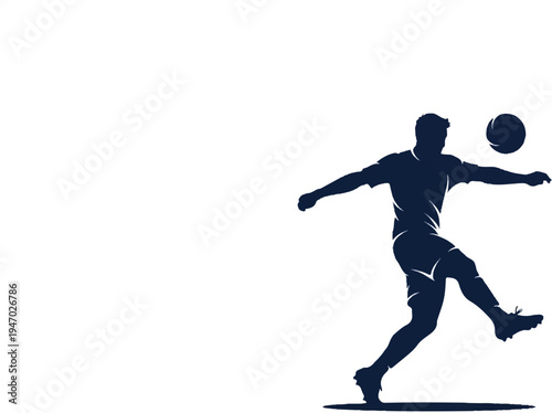 Silhouette of a soccer player kicking a ball