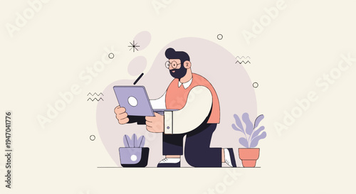 Bearded man wearing glasses kneels with a laptop and plants