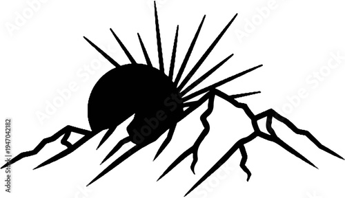 Black silhouette of a sun rising over jagged mountain peaks