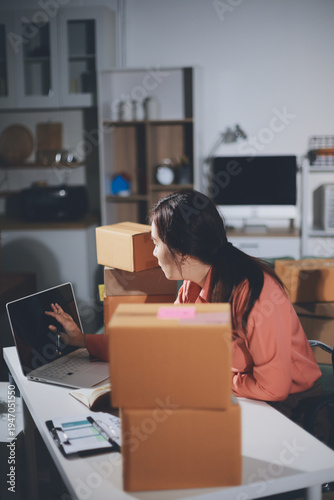 Startup, small business, SME owner check online orders. data logging Business growth, selling products, working with boxes. freelance work at home office online sme business small organization