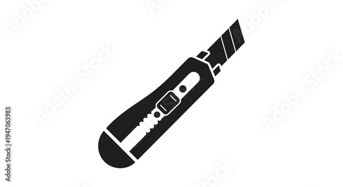 A stark black depiction of a utility knife lies on a white background creating a bold silhouette