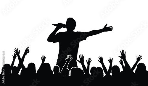 A silhouette of a male singer performing on stage with a cheering crowd raising their hands high