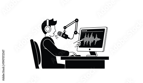 A male podcaster recording audio content while sitting at a desk with a computer and microphone
