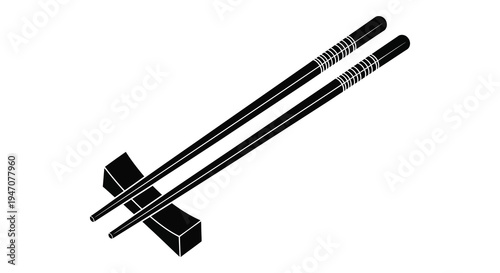 A minimalist depiction of a pair of black chopsticks resting on a small stand