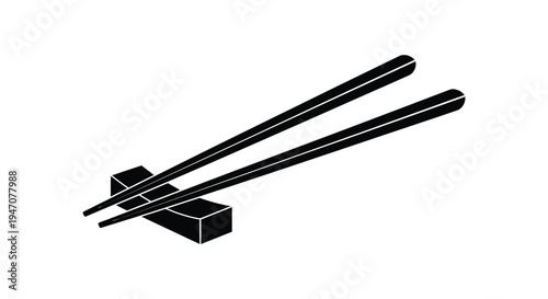 Black chopsticks resting on a chopstick rest isolated on a white background