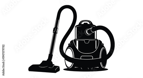 Black and white illustration of a canister vacuum cleaner with attached hose
