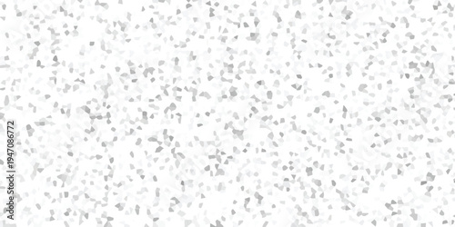 Subtle mosaic pattern with irregular grey and white geometric shapes creating a textured abstract background for design