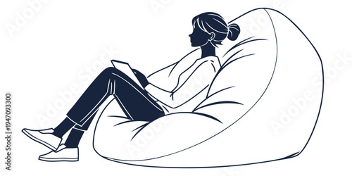 Woman relaxing on a large bean bag chair while reading a book.