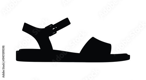 A stark black silhouette of a single summer sandal showcasing its simple design and strap details silhouette