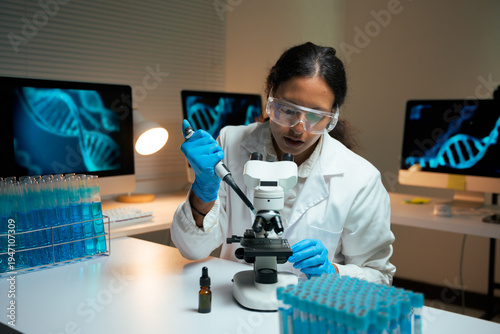 Female scientist doing genetic research in laboratory