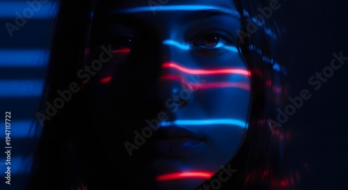 Glowing neon face in dark background with blue and red lights