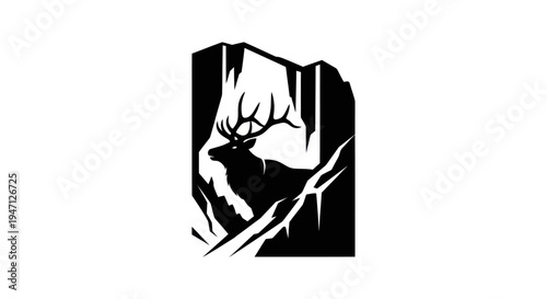 Silhouette of a stag in a mountain setting