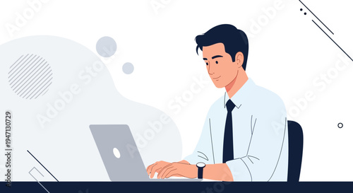 Young businessman working on a laptop at his desk, modern office interior, professional, focused