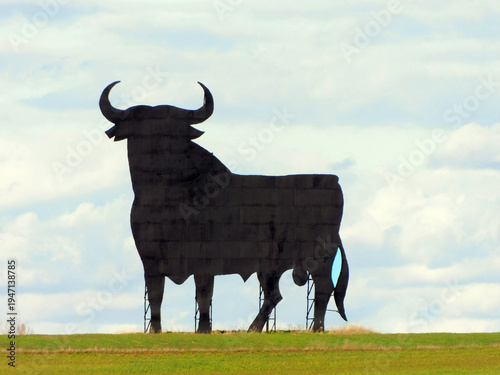 Osborne Bull Silhouette on a Green Hill in Spain