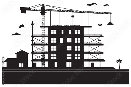 silhouette of a construction site construction site with crane