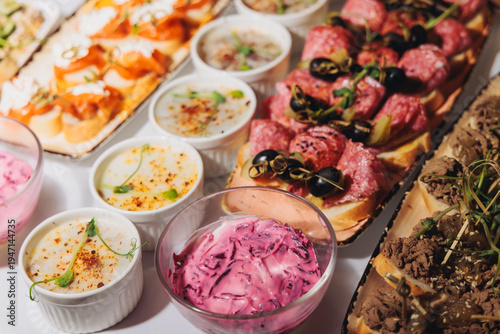 Photography Traditional Russian cuisine dishes on a New Year table, dressed herring salad, k