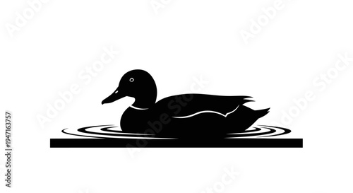 Silhouette of a duck swimming calmly on water.