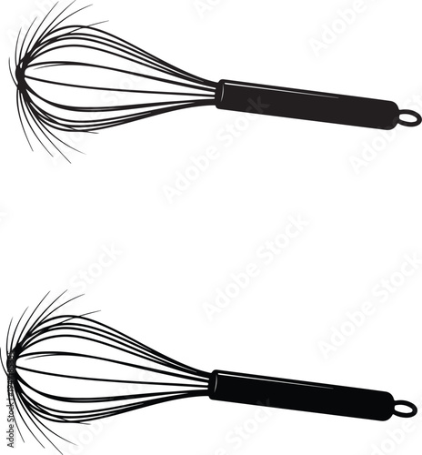 Stainless steel whisk isolated on a white background for kitchen mixing and cooking use
