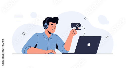 Man with headphones setting up webcam for online meeting or streaming