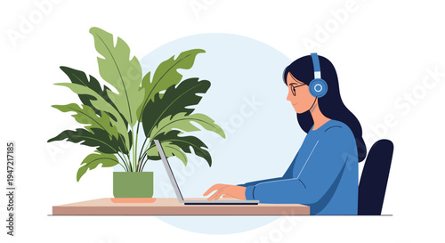 Young woman with headphones working on her laptop at a desk with a large green houseplant in a calm home office environment.