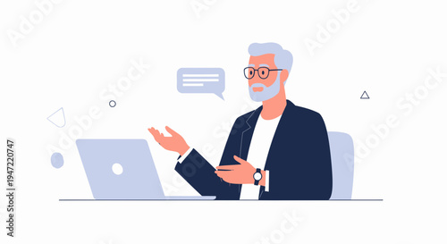 Senior businessman with glasses talking on a video call, working on a laptop