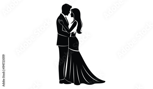 A romantic silhouette of a bride in a flowing gown and a groom in a suit standing face to face