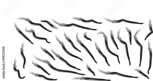 Vibrant assortment of spontaneous black ink brushstrokes, capturing fluid movement and raw artistic expression, perfect for dynamic backgrounds and creative graphic design projects