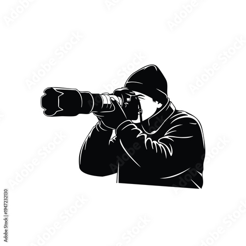 Professional photographer silhouette using telephoto lens for nature