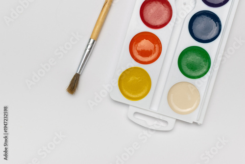 Wallpaper Mural Colorful Watercolor Palette with Wooden Brush on White Background Torontodigital.ca