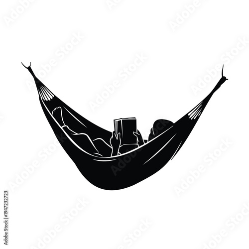 Silhouette person relaxing reading book in hammock