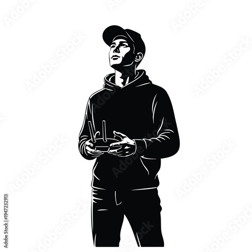Silhouette young man with drone controller looking up at sky with focus