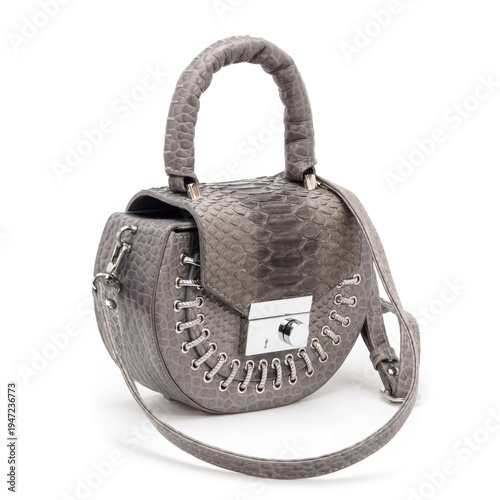 Photos High-quality studio shot of a stylish female bag with a python effect