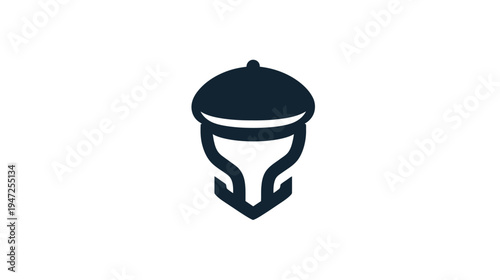 A simple, dark-colored graphic featuring an acorn shape, with a rounded top and geometric lines