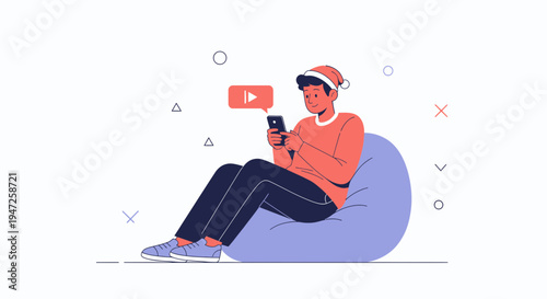 Man watching video on phone while relaxing on bean bag, festive hat