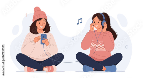 Two friends listening to music together on headphones, sharing audio from one phone.