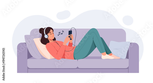 Woman Relaxing on Sofa Listening to Music on Smartphone with Headphones