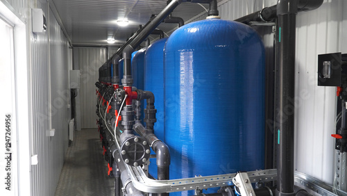 Fotografía Water purification filter equipment in plant workshop.