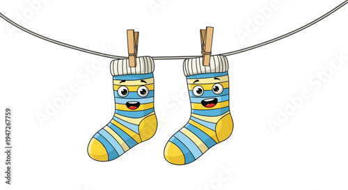 Pair of cute cartoon socks with happy faces hanging on a clothesline with wooden pegs, laundry day concept for children clothing.