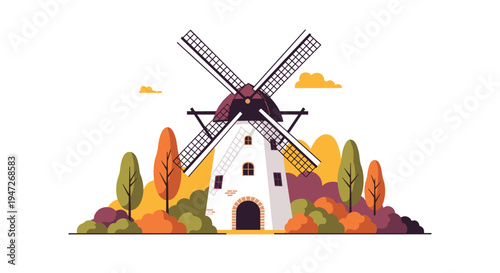 Traditional white windmill located in a scenic autumn countryside landscape surrounded by colorful orange and yellow trees under a clear sky.