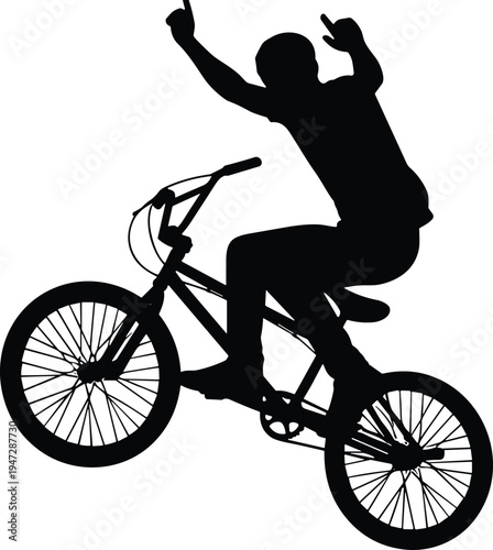 Silhouette of BMX rider performing stunt, vector artwork capturing dynamic motion