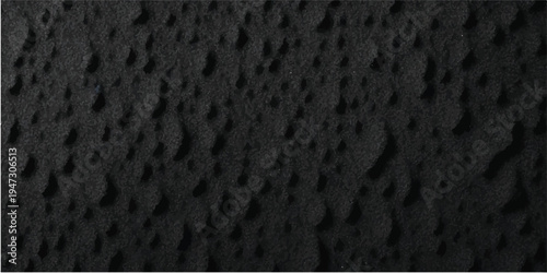 A dark blue grunge background with a rough stone texture and grey macro details creates a seamless black material design for a textured wall wallpaper