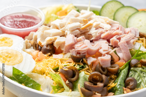 Chef salad with ham, turkey, egg and cheese