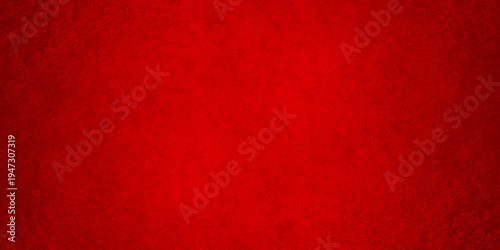 vibrant red textured background with subtle vignette and granular stone surface for festive holiday or luxury design