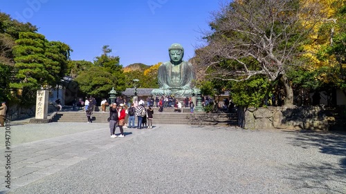 KAMAKURA, JAPAN. DEC 2025. HYPERLAPSE. Panoramic view of the Giant Buddha bronze statue at Kōtoku-in Temple in Kamakura Prefecture, Japan. This statue is an attraction that draws thousands of tourists