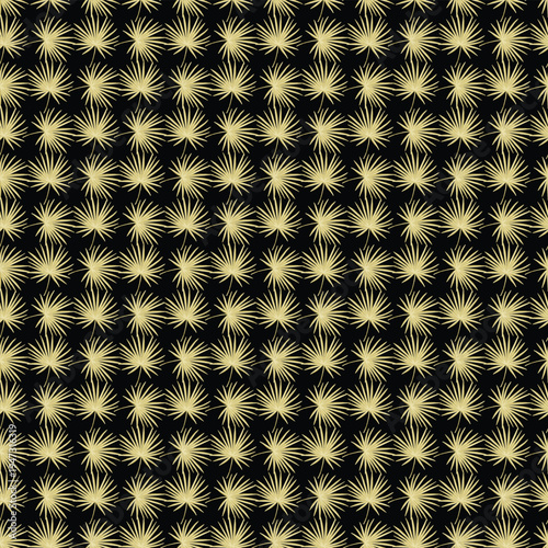 Elegant gold starburst pattern on a black background for creative design projects.
