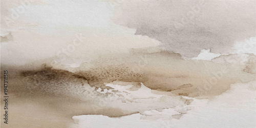 Foaming blue waves crash against the shore as white water flows from the tide into the sea under a summer sky