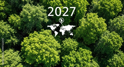 2027 global environmental initiative Aerial view of lush green forest canopy.