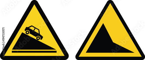 Road signs warning of a steep slope ahead
