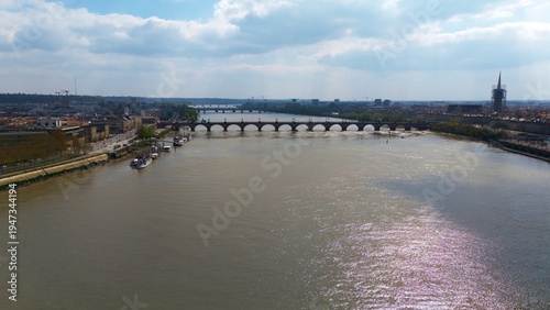 Wallpaper Mural Aerial view of the Pont de Pierre bridge and Garonne River in Bordeaux France with historic waterfront and river reflections  Torontodigital.ca